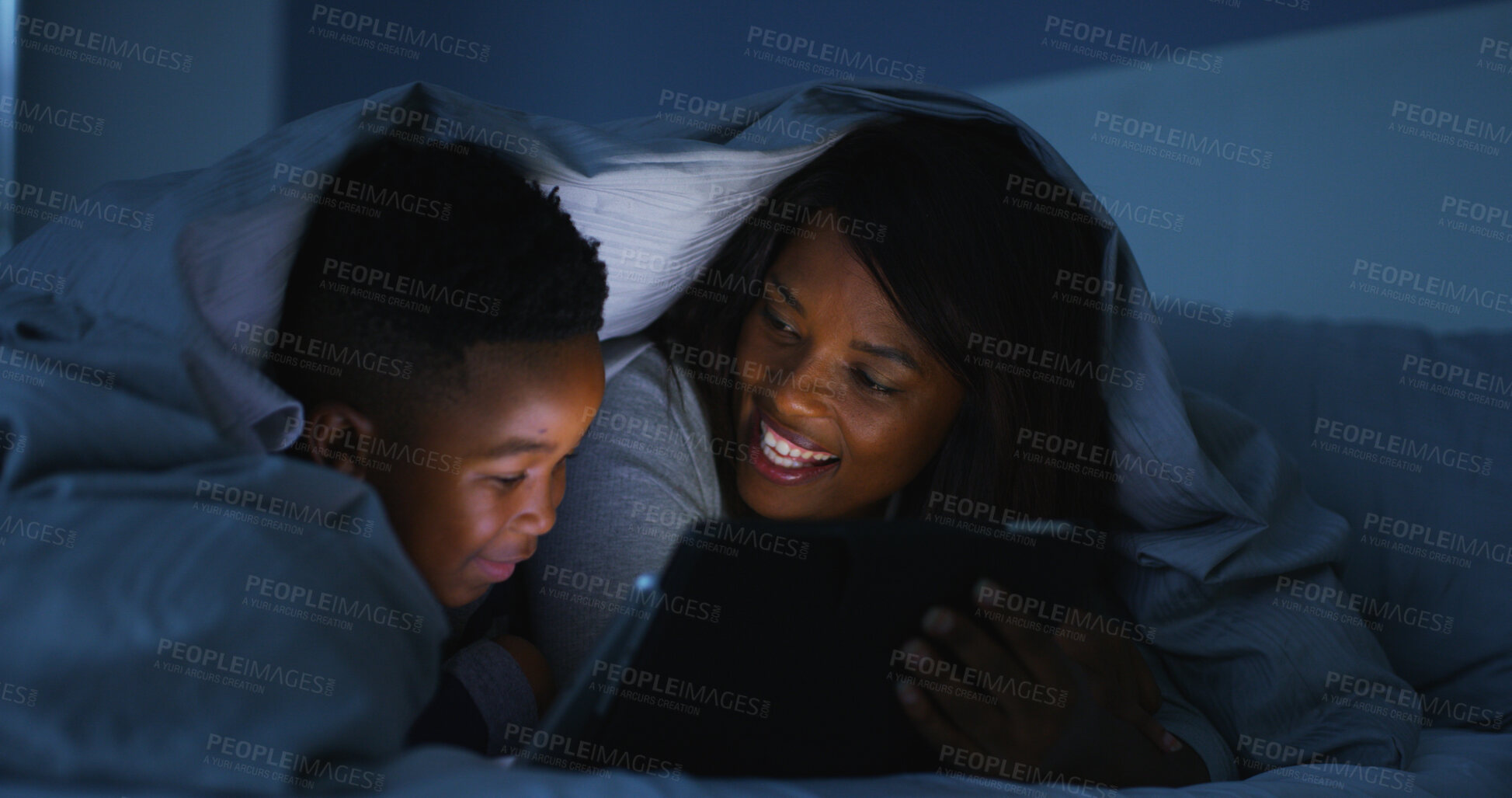 Buy stock photo Night, mother and child with tablet in bed for watching cartoon, streaming service and online movie. Black family, happy woman and kid in home with digital app for reading bedtime ebook and bonding