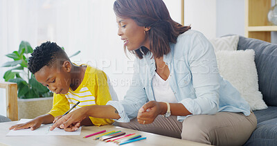 Buy stock photo Coloring pencils, homework and mother helping child in home for education, creativity or learning. Teaching, bonding and mom with boy kid for development activity with drawing in living room at house