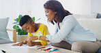 House, mom and education for child, teaching and smile with son in living room, learning or care for boy. Home, woman and kid with notebook in lounge, knowledge or family in apartment with assignment