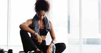 Buy stock photo Woman, gym and tired on floor, fitness and break with water bottle, wellness and breathing at training. Girl, exhausted and liquid for health, fatigue and burnout with rest, workout or exercise club