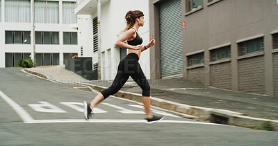 Buy stock photo Running, exercise and woman with earphones, outdoor and practice for marathon in morning, speed and blurred. Fitness, runner and person on road for sports, athlete and training with energy for cardio