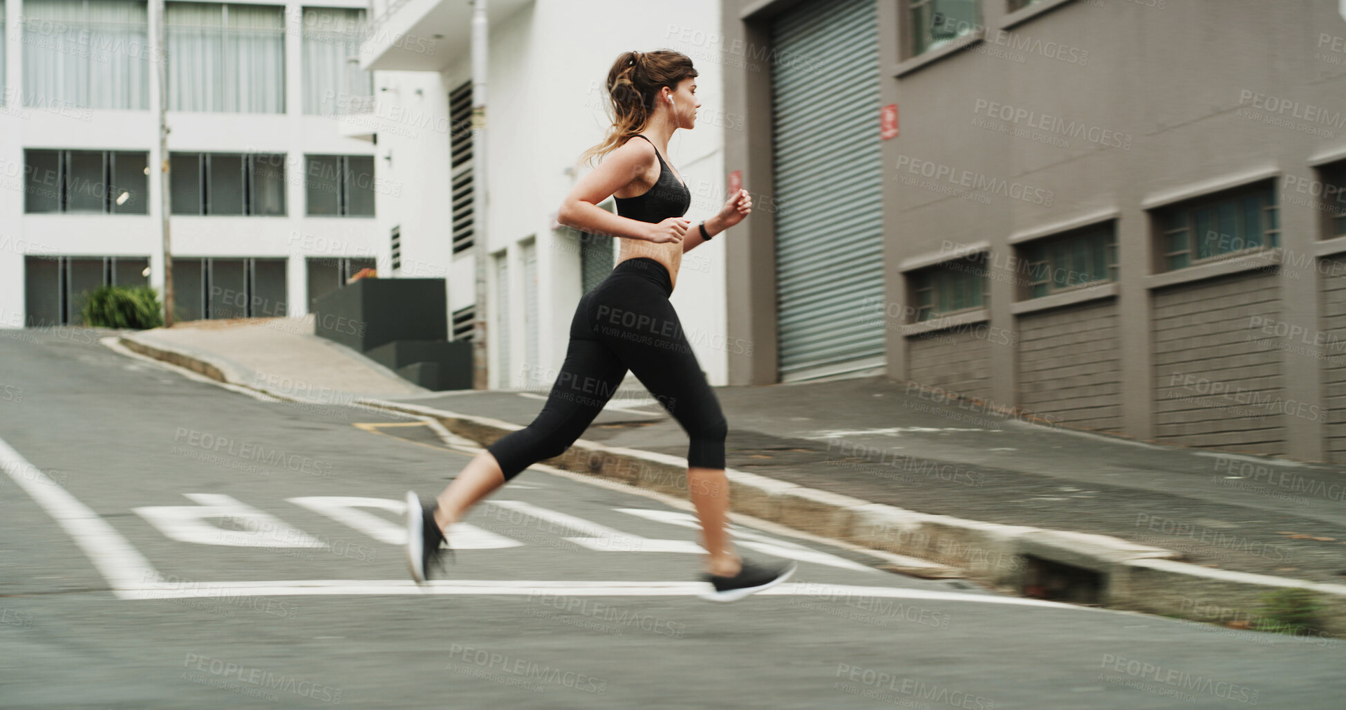 Buy stock photo Running, exercise and woman with earphones, outdoor and practice for marathon in morning, speed and blurred. Fitness, runner and person on road for sports, athlete and training with energy for cardio