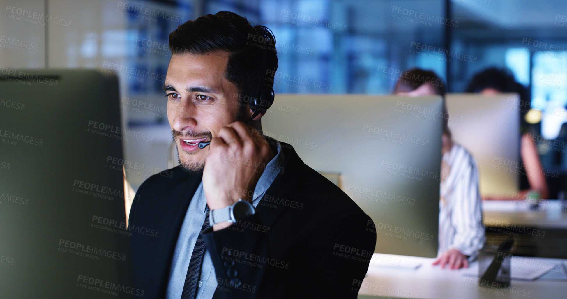Buy stock photo Night, communication or businessman in call center with computer, consulting or sales at help desk. Virtual assistant, answer or customer service agent with mic headset, online support or loan advice