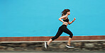 Running, speed and woman on street, fitness and practice for marathon in morning, exercise or blurred. Mockup space, runner and person on road for workout, athlete and training with energy for sports