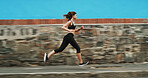Running, speed and woman on street, outdoor and practice for marathon in morning, exercise and fitness. Healthy, runner and person on road for workout, athlete and training with energy for sports