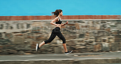 Buy stock photo Running, speed and woman on street, outdoor and practice for marathon in morning, exercise and fitness. Healthy, runner and person on road for workout, athlete and training with energy for sports