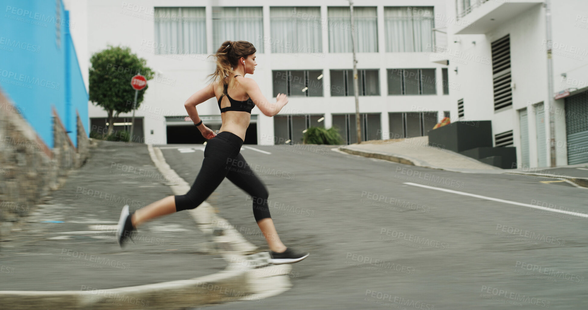 Buy stock photo Running, athlete and woman with earphones, outdoor and practice for marathon in morning, speed and blurred. Fitness, runner and person on road for sports, exercise and training with energy for cardio