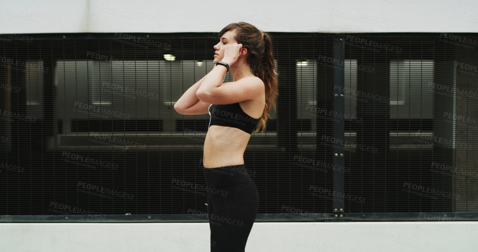 Buy stock photo Girl, runner and earphones in city, exercise and ready with start, training and audio tech. Woman, wellness and profile with streaming subscription, sound and listen to music for fitness in Argentina