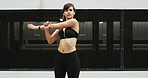 Fitness, city and woman with warm up exercise for running with race, marathon or activity training. Sports, health and female person stretching for cardio workout with wellness in urban town.