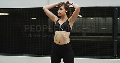 Buy stock photo Woman, earphones and exercise in city, thinking and ready to start with fitness, training or challenge. Girl, runner and streaming subscription for listening to music, workout or outdoor in Argentina