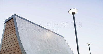 Buy stock photo Architecture, skating ramp and outdoor with park of city for extreme sports, low angle and urban. Asphalt, action and recreational space with skatepark for adventure, concrete and training ground