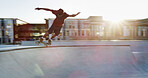 Man, skateboard and skating on ramp at park with balance, fitness and practice action trick for competition. Sunshine, skater and sports training for performance, recreation and adventure with talent