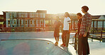 Skateboard, sunset and friends in city for sport, competition challenge and start exercise by bowl. Outdoor, group and men at skate park for action, performance or ready to practice balance for hobby