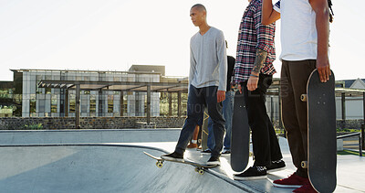 Buy stock photo Skateboard, friends and men in city for sport, competition challenge or start exercise by bowl with space. Outdoor, fitness group or skate park for action, performance or balance with hands for hobby