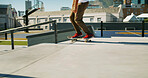 Skate park, shoes and person outdoor for sport, competition challenge and adrenaline. City, energy and legs riding on skateboard for action, performance and practice balance for hobby or exercise
