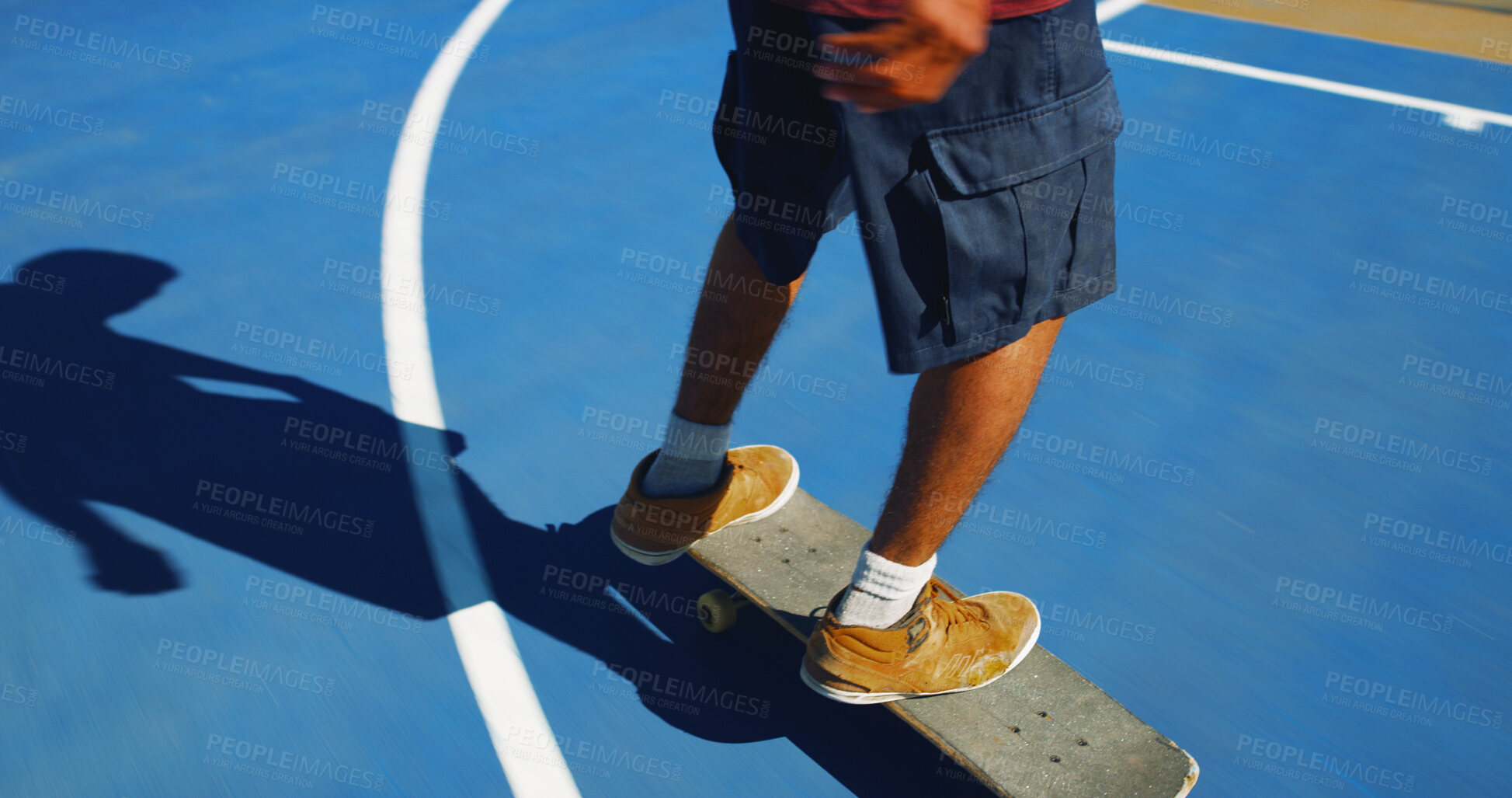 Buy stock photo Skateboard, legs and person learning trick for outdoor hobby, activity or challenge at park. Sports, shoes and feet of skater with sneakers for skating training with skills for competition in city.