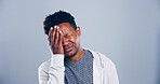 Sad, black man or mistake with stress in studio for mental breakdown, anxiety or pain on a gray background. Male person, emotion or eye strain with headache for pressure or depression on mockup space
