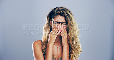 Buy stock photo Woman, grief and crying with sorrow in studio for mourning loss, broken heart and bad news. Person, mockup space and sad with depression, mental health and ptsd for trauma memory on gray background