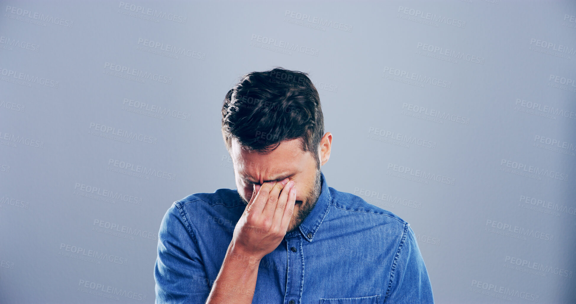 Buy stock photo Sad man, crying and grief with breakup for loss, mental breakdown or trauma on a studio background. Male person, model or heartbreak with lonely tears or expression for eye strain on mockup space