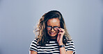 Sad, girl and crying with emotions in studio for mourning loss, broken heart and bad news. Person, mockup space and grief with depression, mental health and ptsd for trauma memory on gray background