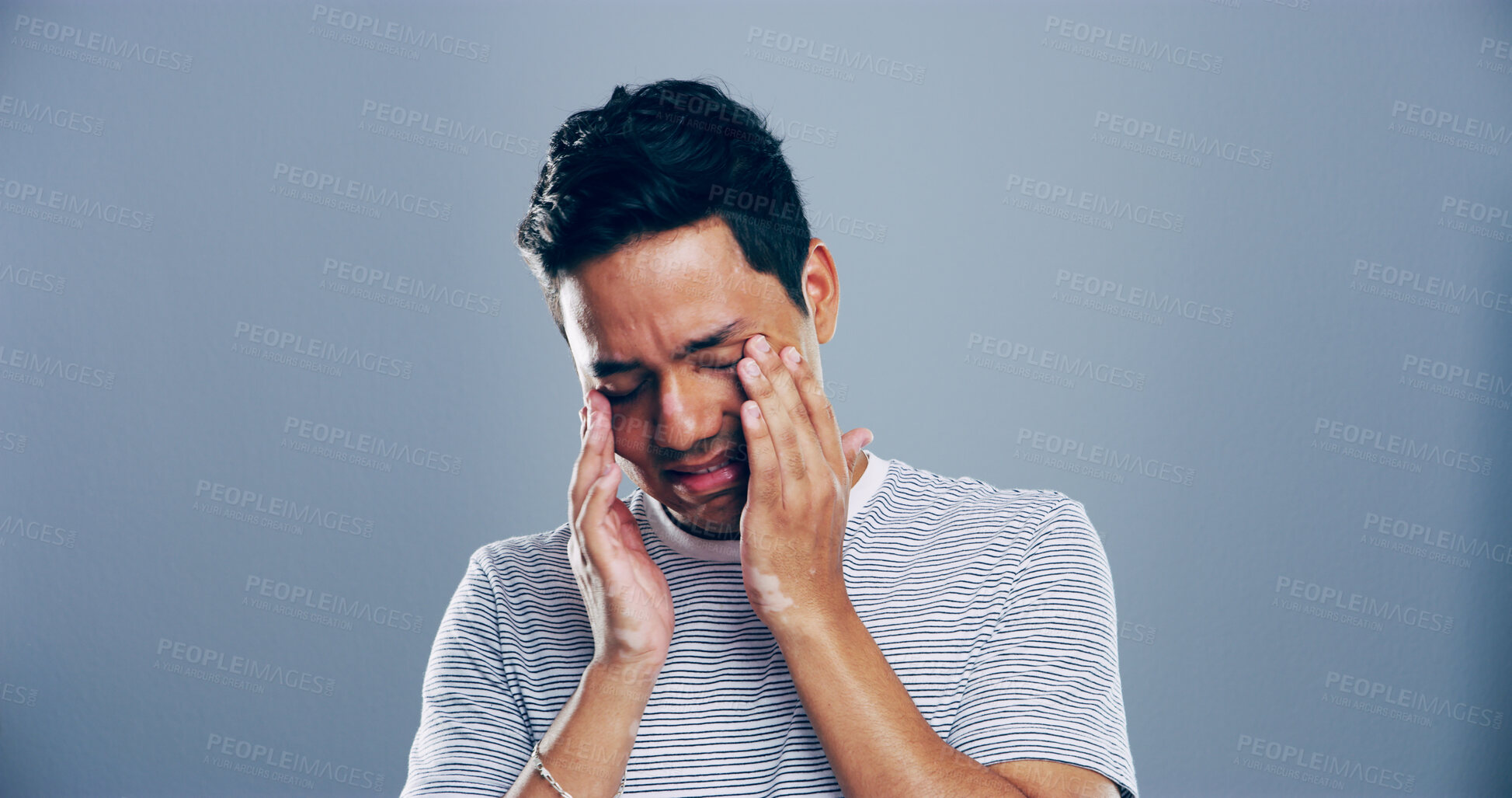 Buy stock photo Sad man, mistake or depression with stress in studio for mental breakdown or anxiety on a gray background. Male person, emotion or sulk eyes with headache, tears or expression for loneliness on space