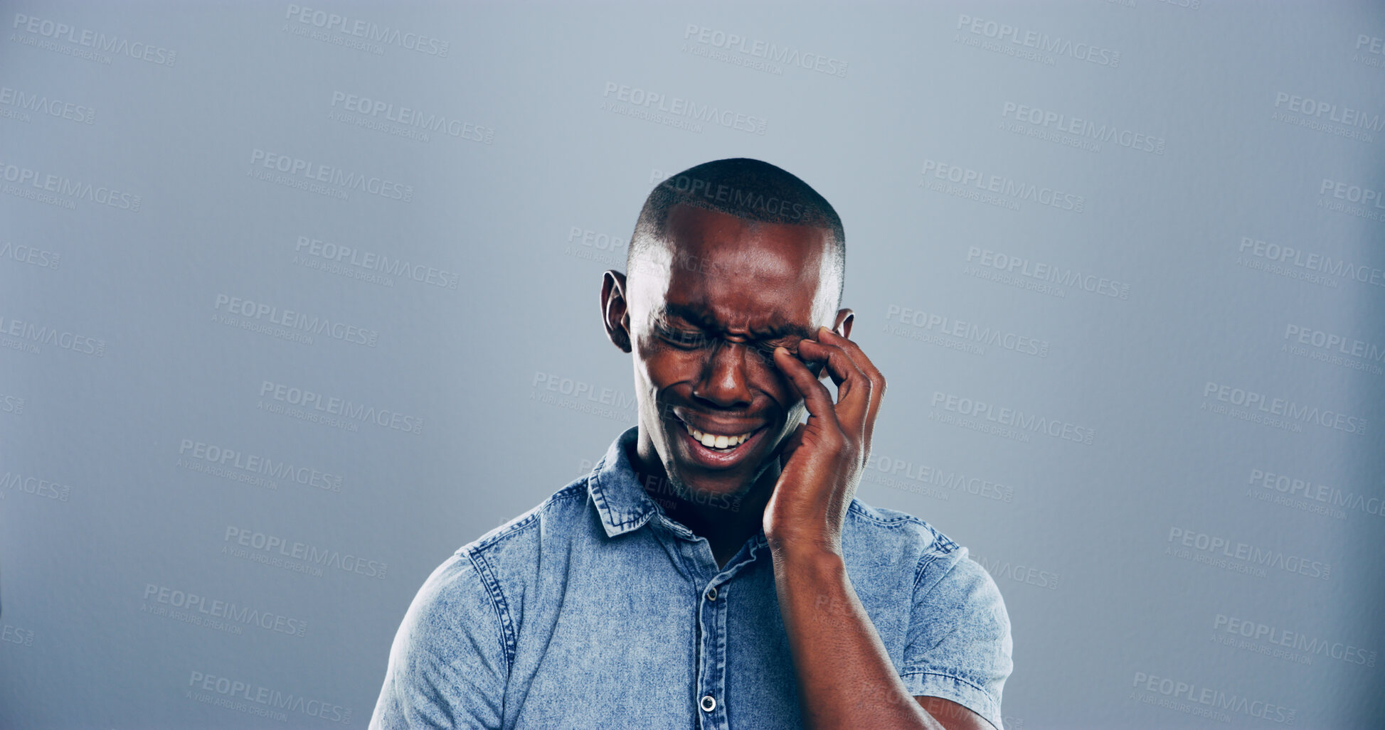 Buy stock photo Sad, black man and crying in studio with emotional breakup, mental breakdown and gray background. Male person, expression or sulk eyes with tears or broken heart for loneliness on mockup space