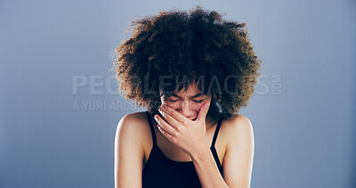 Buy stock photo Crying, sad and woman in studio, sorrow and broken heart on blue background. Person, model and girl with depression stress and grief with loss of relationship, mourning and breakup with tears or pain