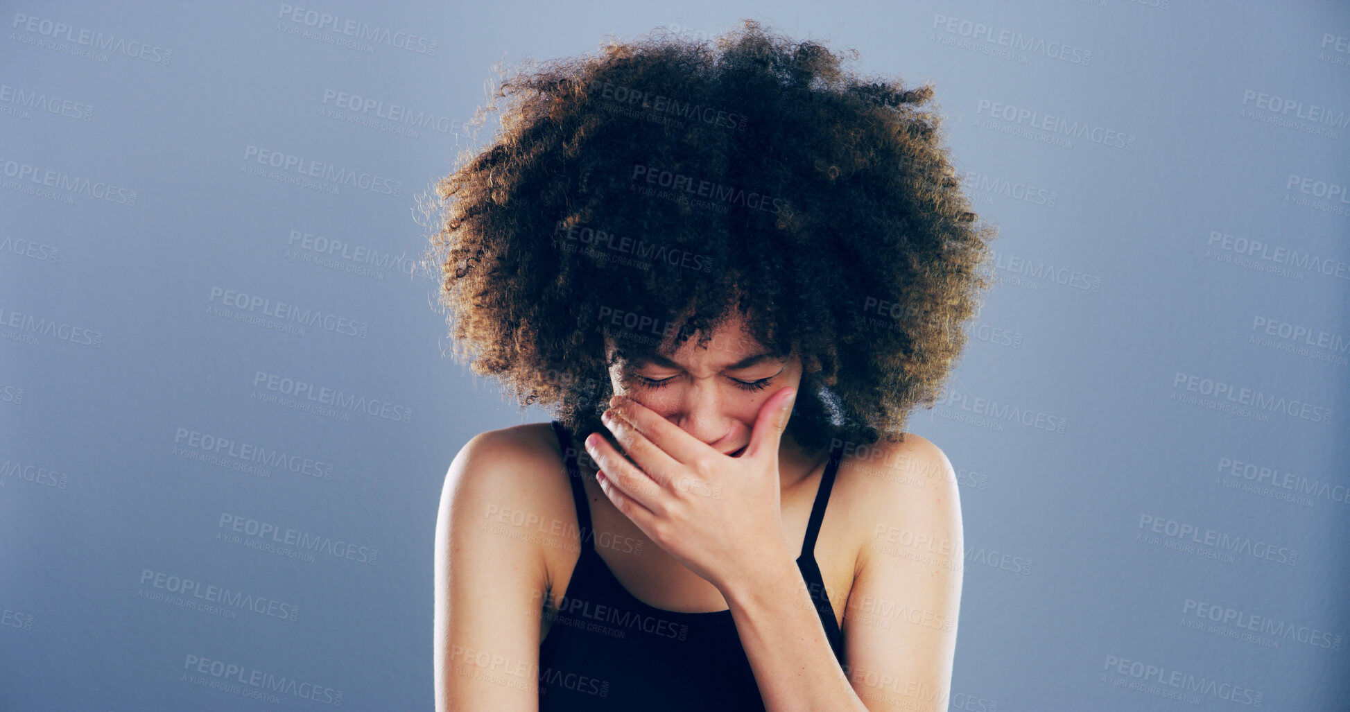 Buy stock photo Crying, sad and woman in studio, sorrow and broken heart on blue background. Person, model and girl with depression stress and grief with loss of relationship, mourning and breakup with tears or pain