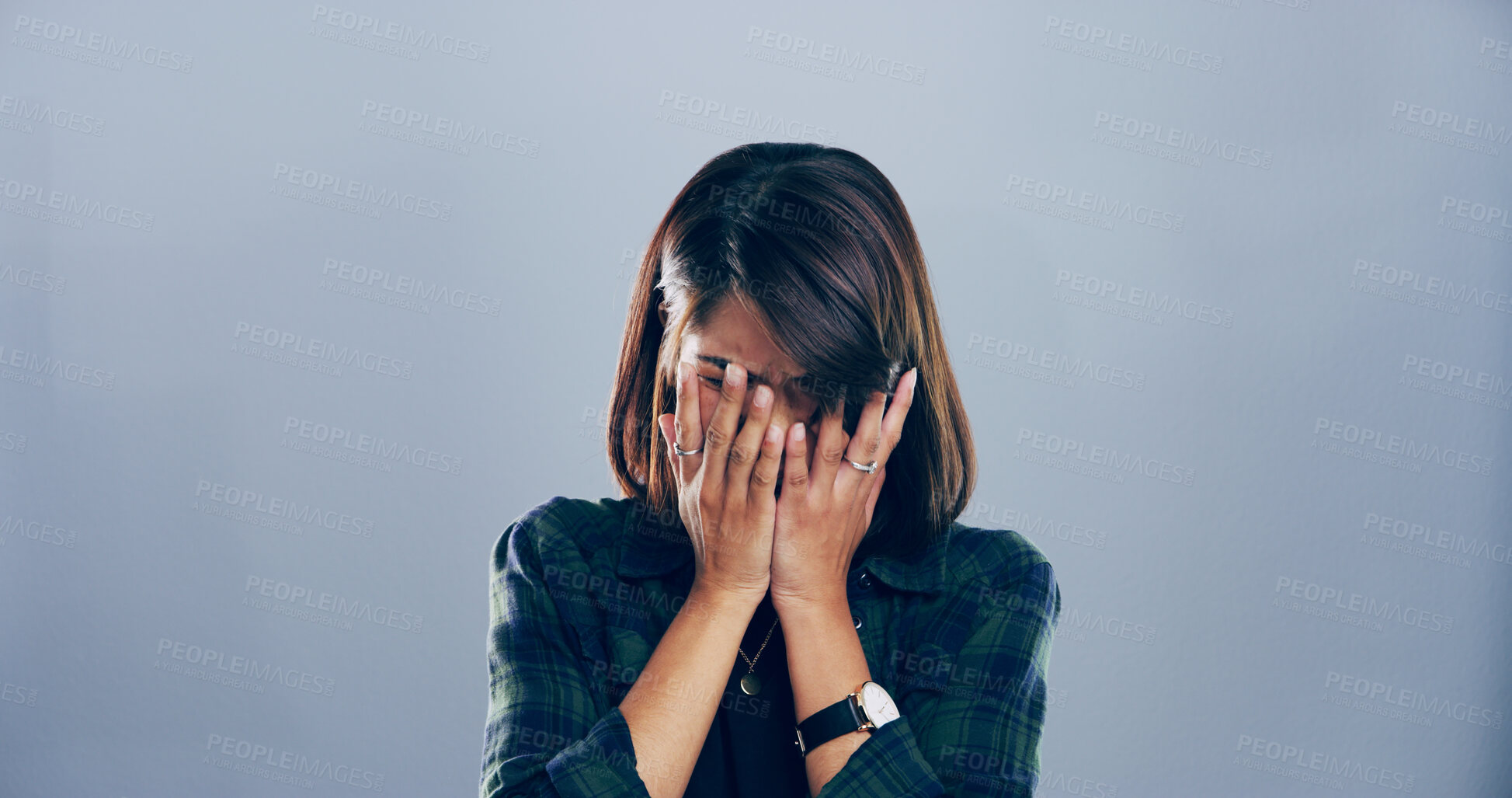 Buy stock photo Sad, woman and crying of breakdown in studio for divorce fail, broken heart and bad news. Mockup space, grief and person with depression, marriage mistake and ptsd of trauma memory on gray background