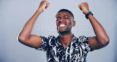 Buy stock photo Happiness, excited and black man with fist pump for win, success and celebration with energy on studio background. Yes, bonus and reward with reaction to victory for winner, promotion or achievement