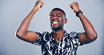 Happiness, excited and black man with fist pump for win, success and celebration with energy on studio background. Yes, bonus and reward with reaction to victory for winner, promotion or achievement