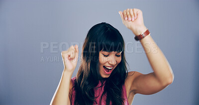 Buy stock photo Dance, energy and music with happy woman in studio for celebration, clubbing or party fun. Disco, moving and smile of excited dancer person on gray background space for beat, choreography or rhythm