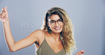 Buy stock photo Dance, glasses and portrait of happy woman in studio for celebration, clubbing or party fun. Music, smile and vision with excited dancer person on gray background space for choreography or rhythm