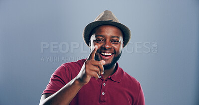 Buy stock photo Black man, portrait and pointing at you for invitation, welcome or join us with smile on blue studio background. Choice, decision or opportunity with happiness for space, motivation and offer