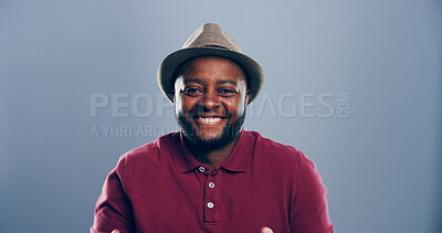 Buy stock photo Space, happy or portrait of black man in studio with confidence, mockup or humor. Comedian, comic performer or face of African person isolated on grey background with funny joke for creative career