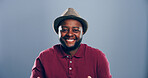 Space, happy or portrait of black man in studio with confidence, mockup or humor. Comedian, comic performer or face of African person isolated on grey background with funny joke for creative career