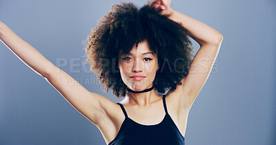 Buy stock photo Dance, energy and portrait of woman in studio for celebration, clubbing or party fun. Afro, disco event and music with confident dancer person on gray background for beat, choreography or rhythm