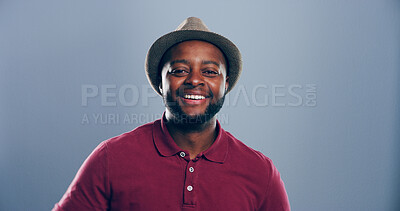 Buy stock photo Space, smile or portrait of black man in studio with confidence, mockup or humor. Comedian, comic performer or face of happy person laughing on grey background with funny joke for creative career