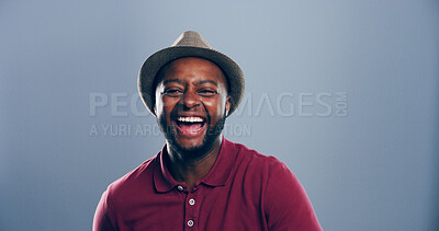 Buy stock photo Space, laughing or portrait of black man in studio with confidence, mockup or humor. Comedian, comic performer or face of happy person on grey background with silly or funny joke for creative career