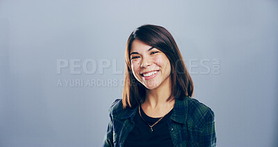 Buy stock photo Creative, smile and portrait of woman in studio with confidence, mockup space and university. College recruitment, student and happy face with about us, opportunity in education and grey background