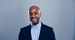 Studio, smile and portrait of black man in business with confidence, mockup space and ambition. Creative professional, entrepreneur and happy face for about us, career opportunity and grey background