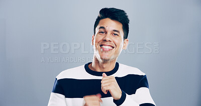 Buy stock photo Celebration, dancing and man with smile, studio and excited for new job, success or graphic designer. Portrait, creative and achievement for person with career growth, grey background or mockup space