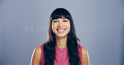 Buy stock photo Happy woman, portrait and expression with positive or cheerful emotion on a studio background. Face, female person or model with smile for casual style, friendly attitude or self confidence on space