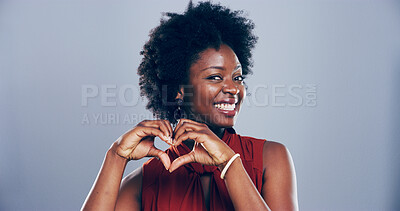 Buy stock photo African woman, portrait and heart hands with love sign, gesture or romance on grey studio background space. Black person, smile and emoji or shape, symbol and kindness for valentines day mockup