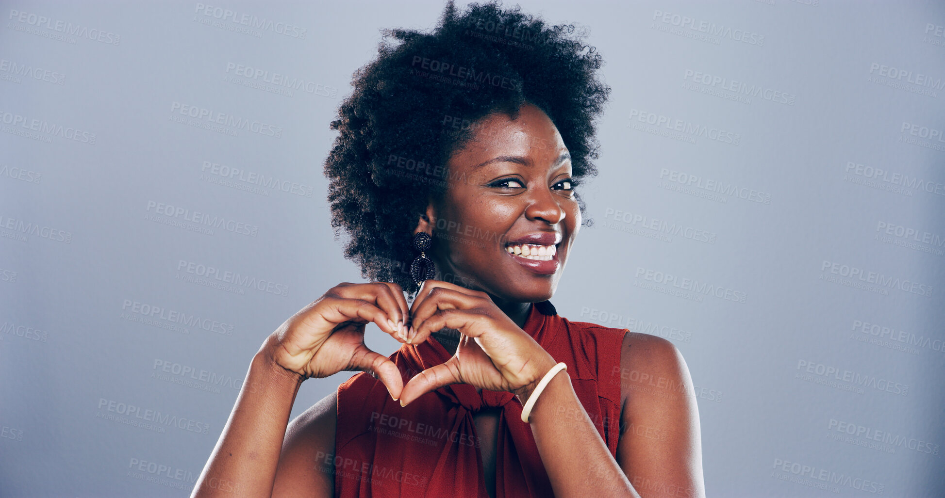 Buy stock photo African woman, portrait and heart hands with love sign, gesture or romance on grey studio background space. Black person, smile and emoji or shape, symbol and kindness for valentines day mockup