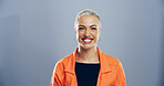 Small business, creative and portrait of woman in studio with confidence, mockup space and gen z style. Female artist, fashion designer and happy face of professional on gray background with smile