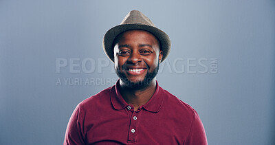 Buy stock photo Fashion, studio and man with hat, portrait and excited for scholarship in university, trendy or outfit. Mockup space, blue background and person with stylish clothes, happy or guy with smile in Kenya