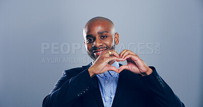 Buy stock photo Happy black man, business and heart hands for love, care or support on gray background in studio. Portrait, African person and shape, emoji or romantic gesture for trust or thank you on mockup space