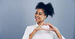 Student, portrait and heart hands with love emoji, gesture and support on grey background space in studio. African woman, smile and sign or shape, symbol and kindness for valentines day date mockup