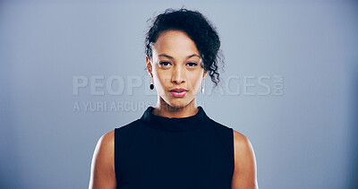 Buy stock photo Serious, business and portrait of woman in studio for freelance career, editing and journalism. Mockup space, professional and isolated person for news agency, publisher and job on gray background